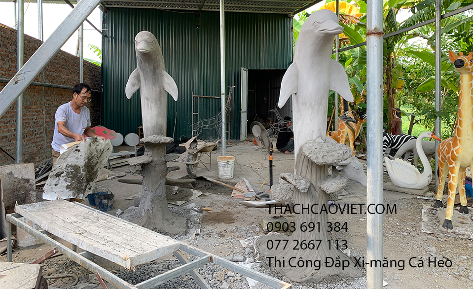 thi công trang trí sân vườn cá heo xi măng landscape